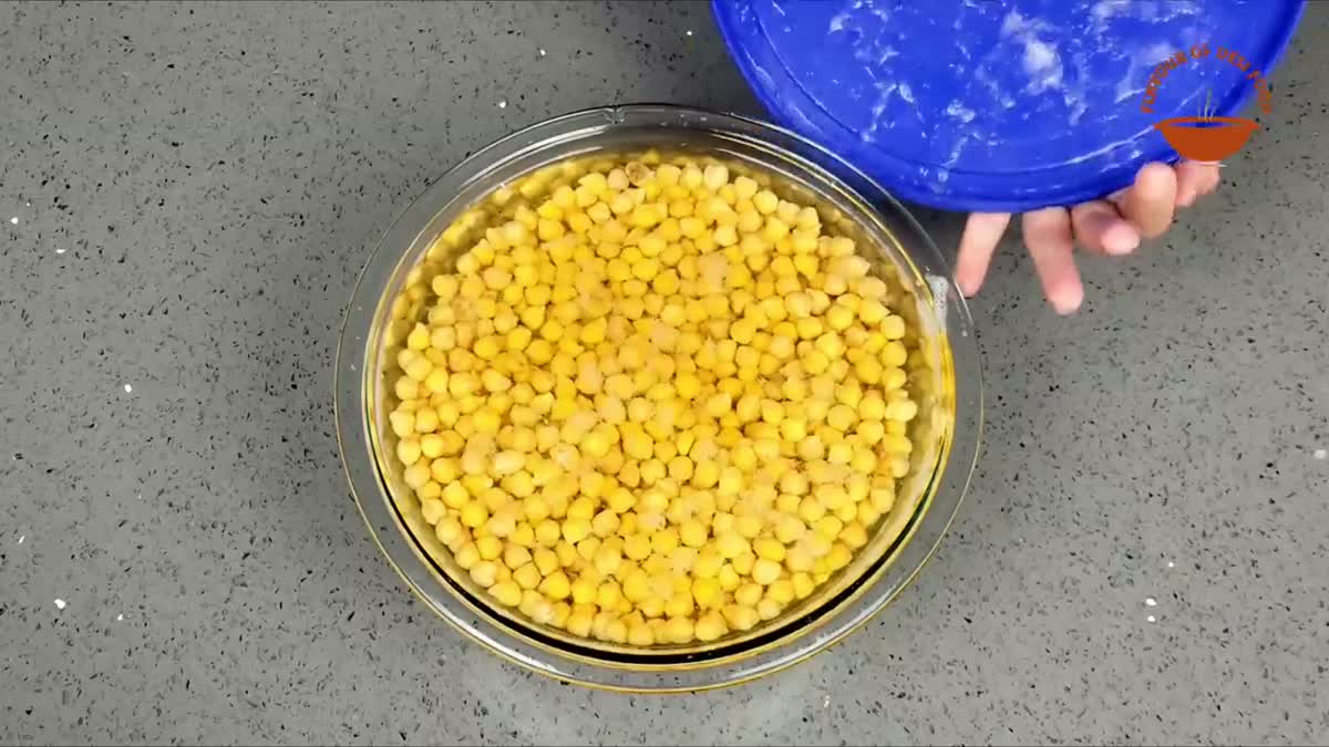 Soaked chickpeas in a glass bowl